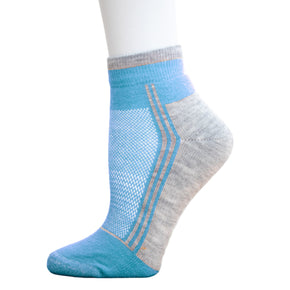 Alpaca Running  and Athletic Ankle Socks. A pair of light blue alpaca ankle running socks in front of a white background. 