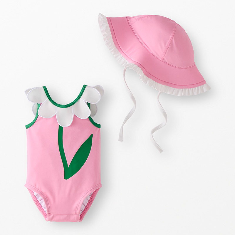 Baby swimsuit with daisy collar and matching pink hat.