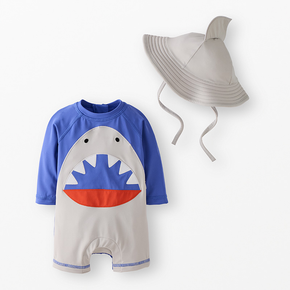 Baby swimsuit with shark image and matching shark fin hat.