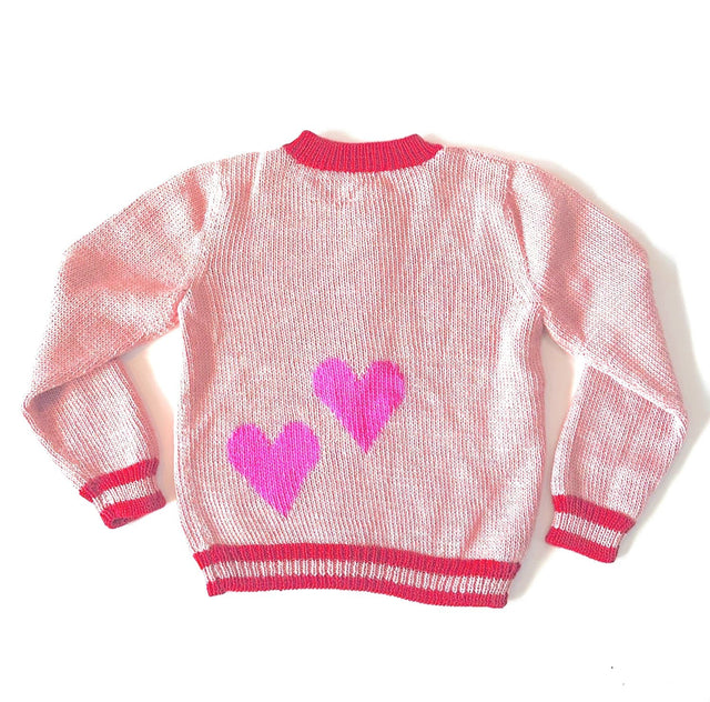 Cabbages and Kings Nuevo Heart Cardigan - pink cardigan with pink hearts on the back and red stripes on a neutral background