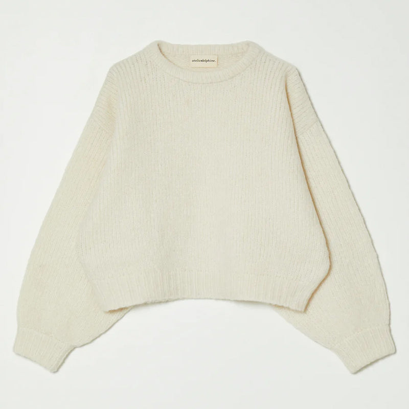 White knit sweater on a white background
