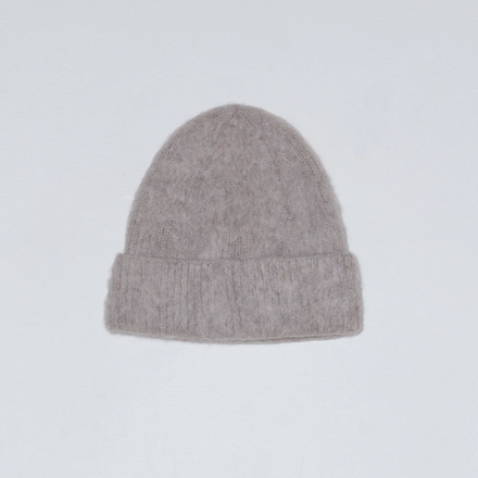 Gray knit beanie on a light gray background