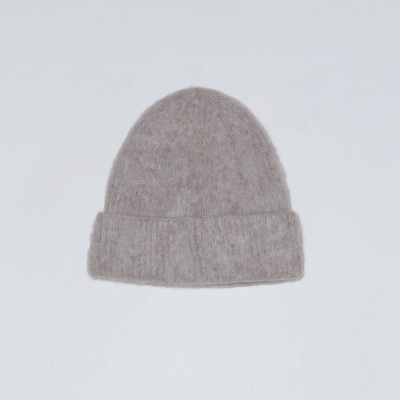 Gray knit beanie on a light gray background