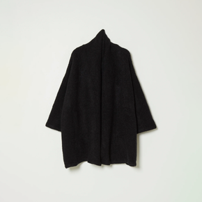 Black knit wrap coat on white background