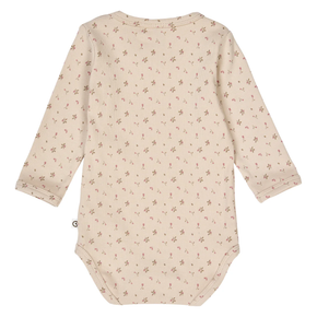 Beige baby bodysuit with floral pattern on a white background