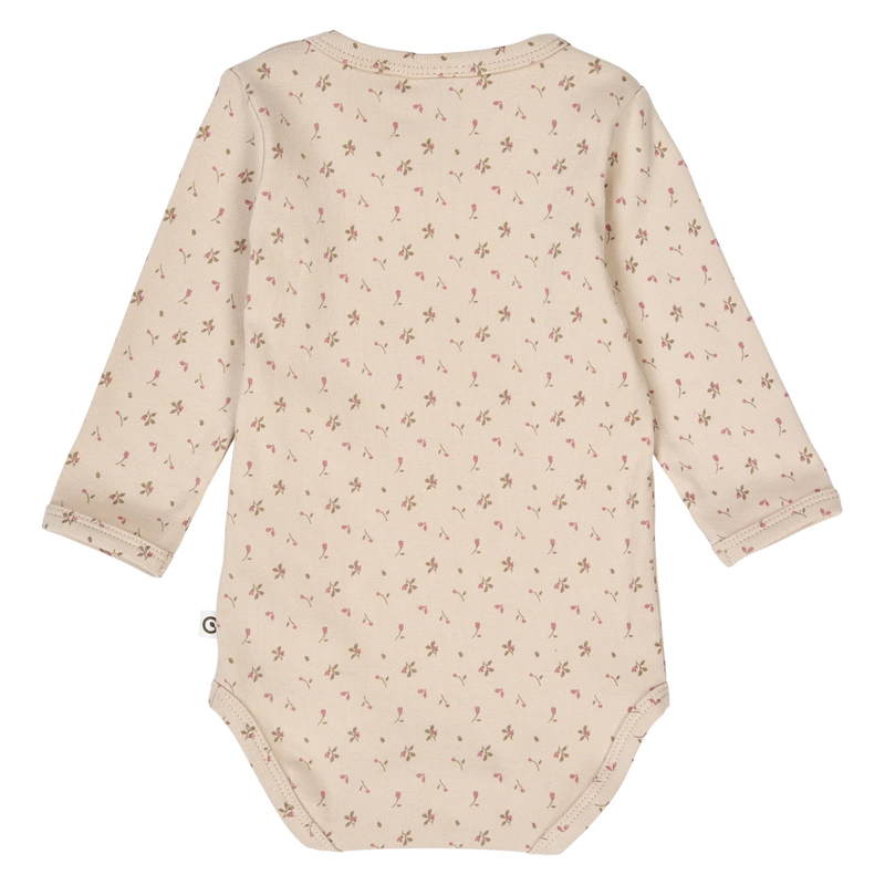 Beige baby bodysuit with floral pattern on a white background