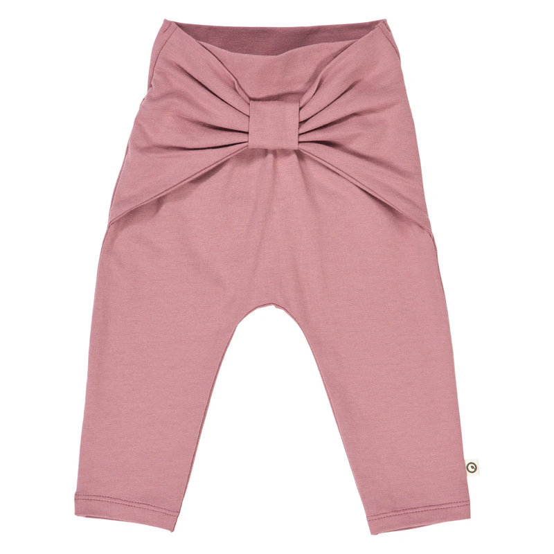 Pink baby leggings with a bow on a white background