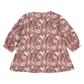 Pink blouse with floral pattern on a white background