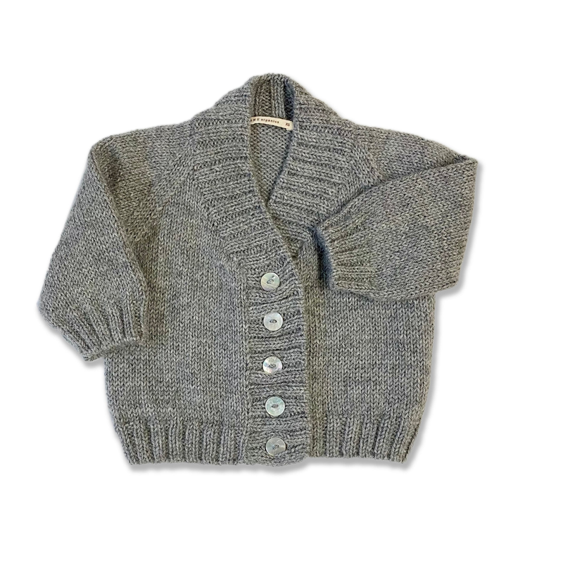 Gray knitted cardigan with buttons on a white background