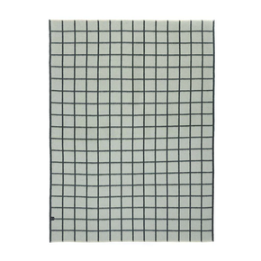 Grid patterned blanket on a white background