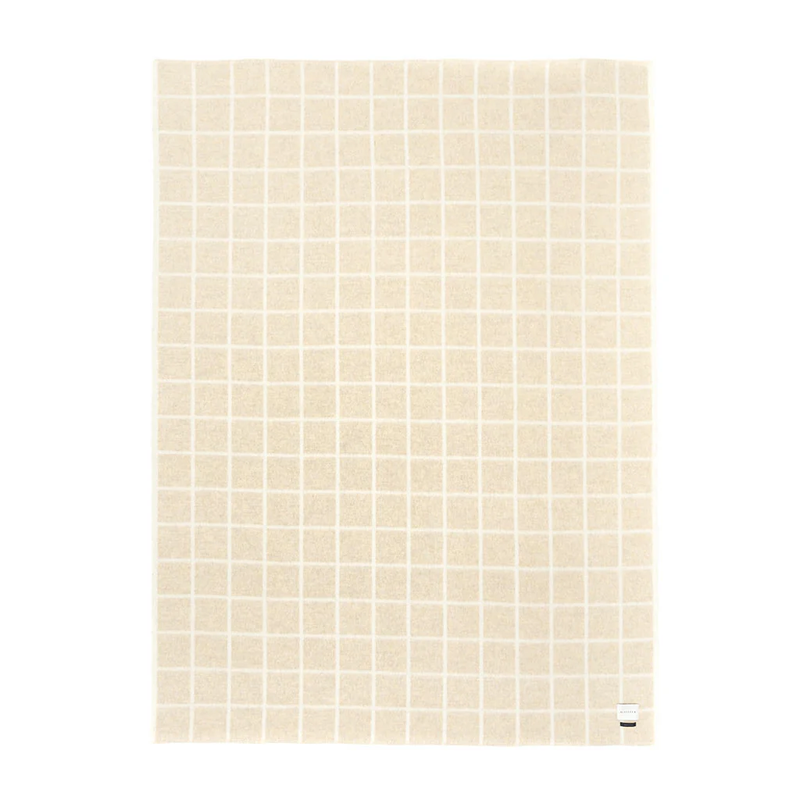 Beige checkered blanket on a white background