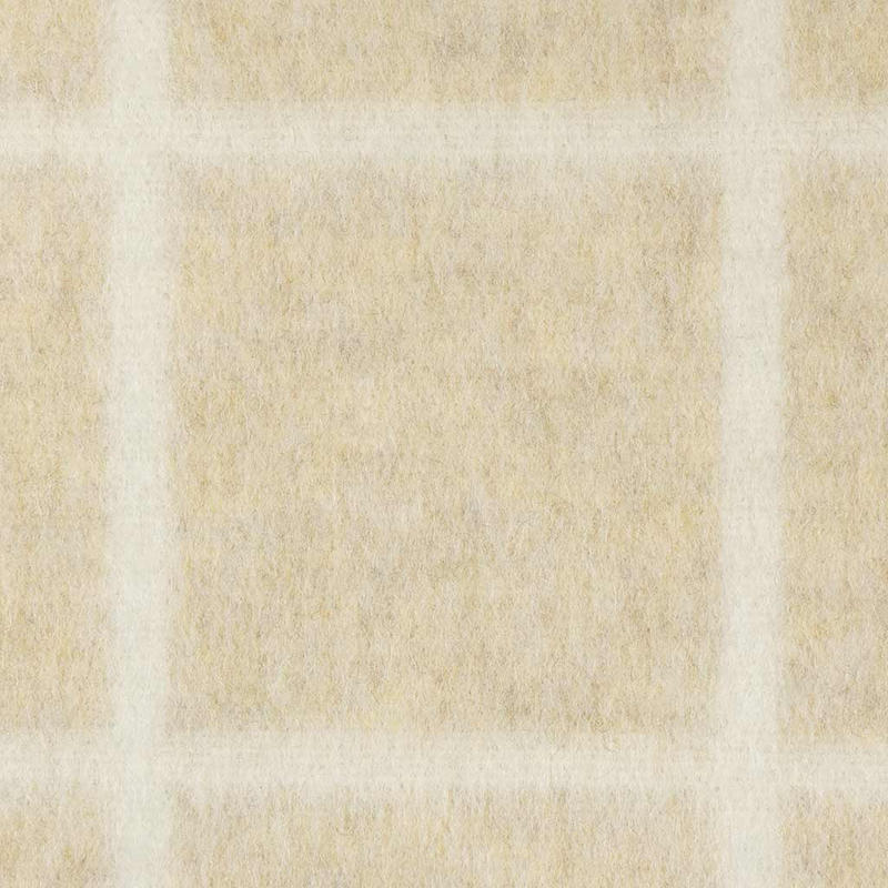Close-up of a beige and white checkered blanket pattern