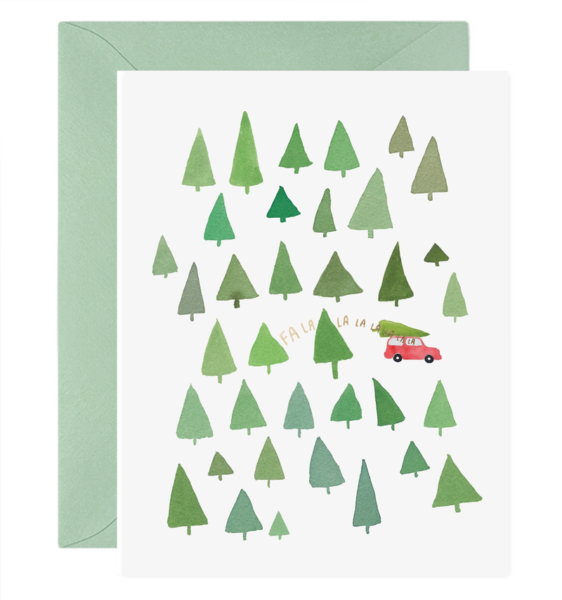 Greeting card with green trees and a red car on a white background