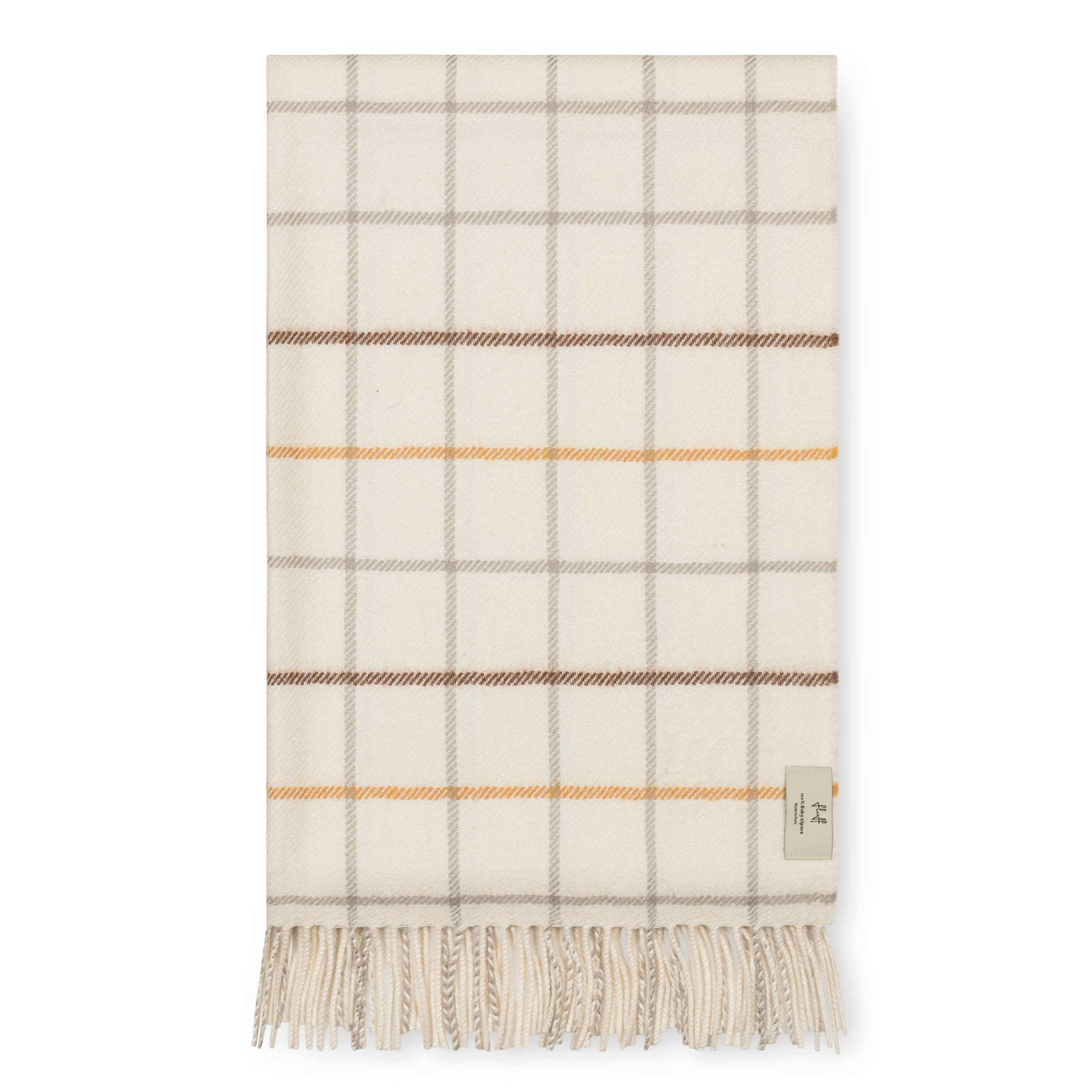 Plaid blanket with fringes on a white background