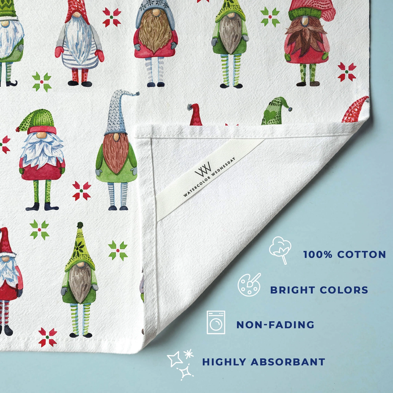 Tea towel with gnome pattern on a light blue background, featuring the brand 'Watercolor Wednesday'.