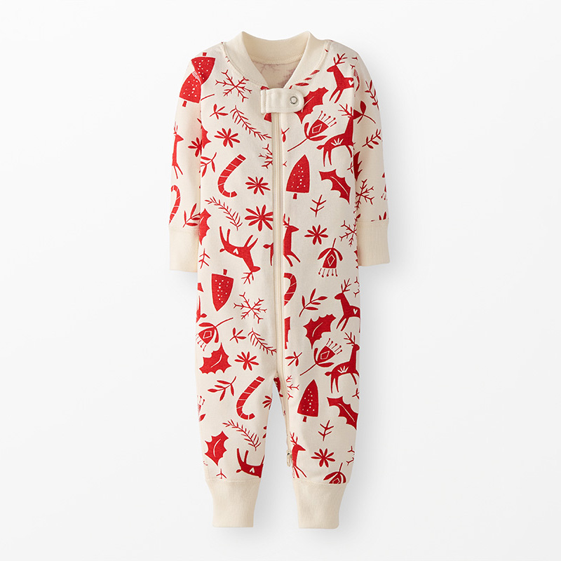 Children's onesie with red animal pattern on a white background