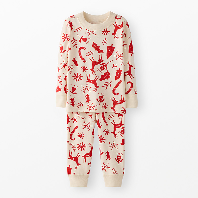 Children's pajama set with red reindeer pattern on a white background