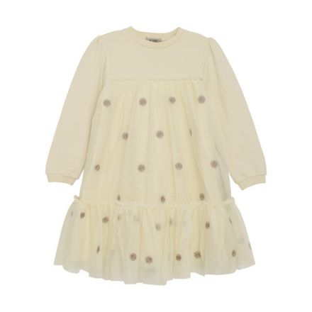 Cream-colored dress with small patterns on a white background