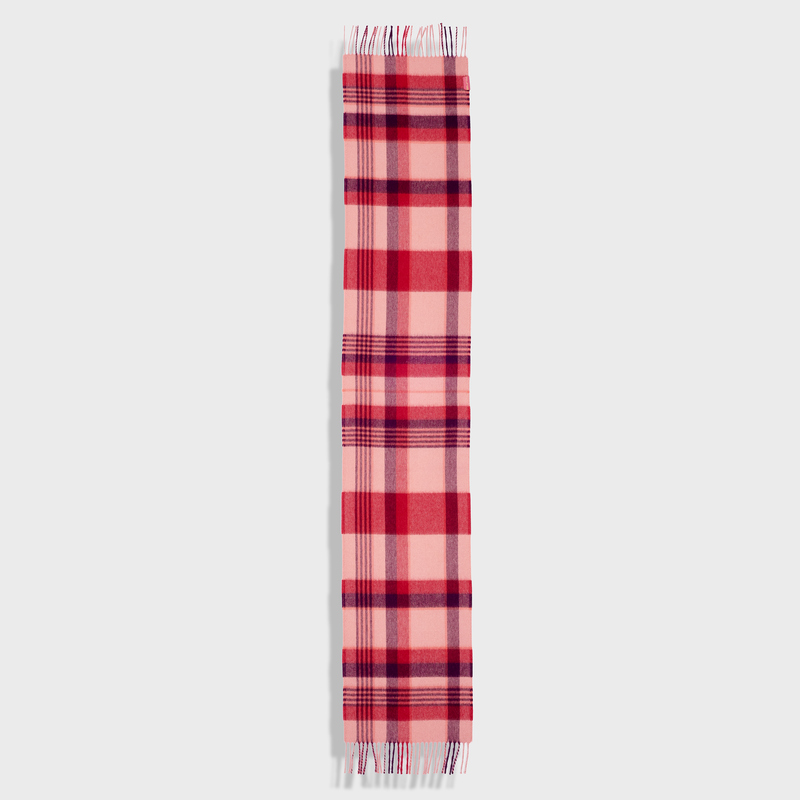 Red and pink plaid scarf on a white background