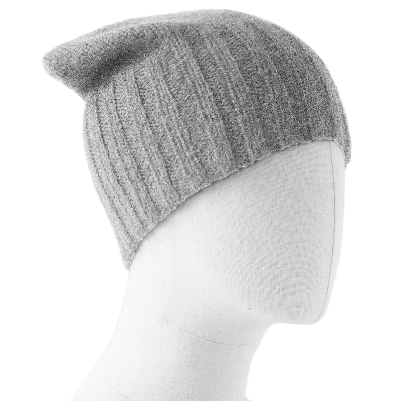 Light gray knit beanie on a mannequin head against a white background