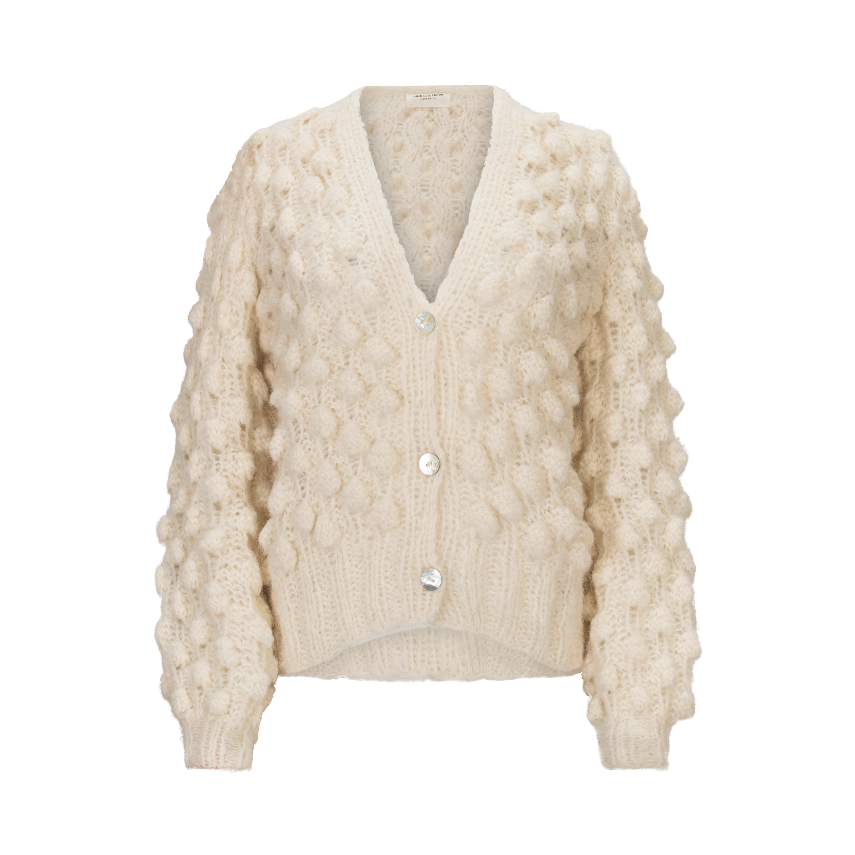 Cream knitted cardigan on a white background