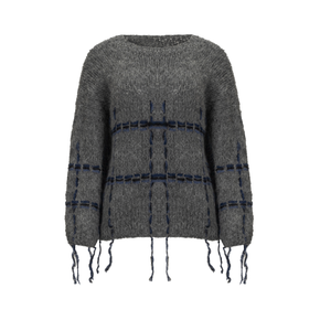 Gray sweater with black and blue plaid pattern and fringe details on a white background