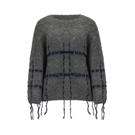 Gray sweater with black and blue plaid pattern and fringe details on a white background
