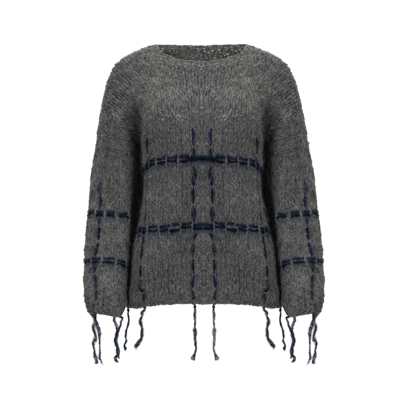 Gray sweater with black and blue plaid pattern and fringe details on a white background