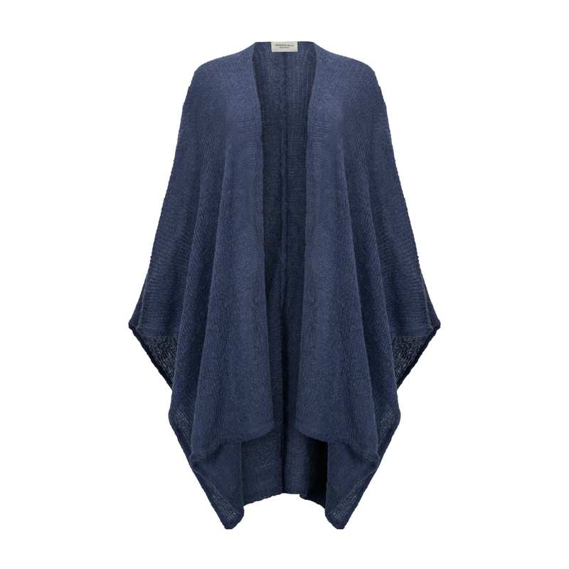 Navy blue poncho on a white background