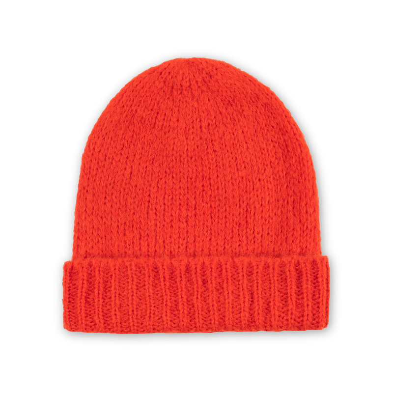 Red knit beanie on a white background