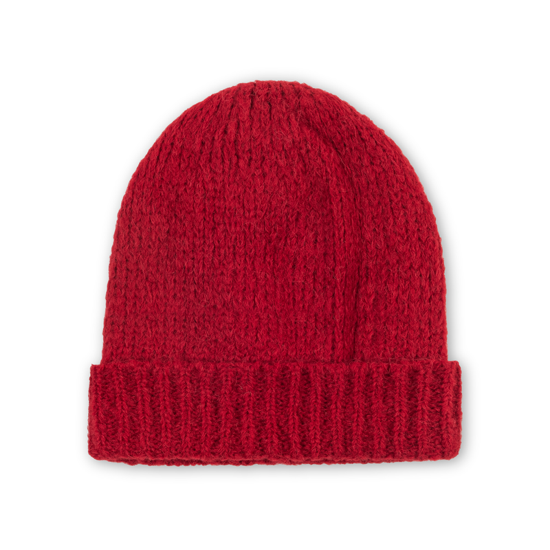 Red knitted beanie on a white background