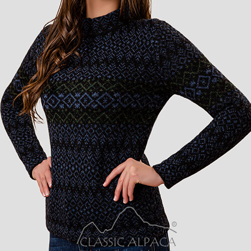 Woman wearing a black patterned sweater with a visible brand logo on a gray background