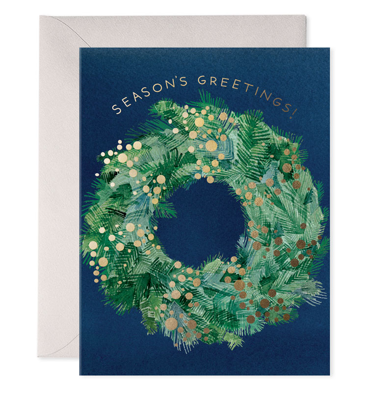 Greeting card with a festive wreath design and 'Season's Greetings!' text on a blue background.