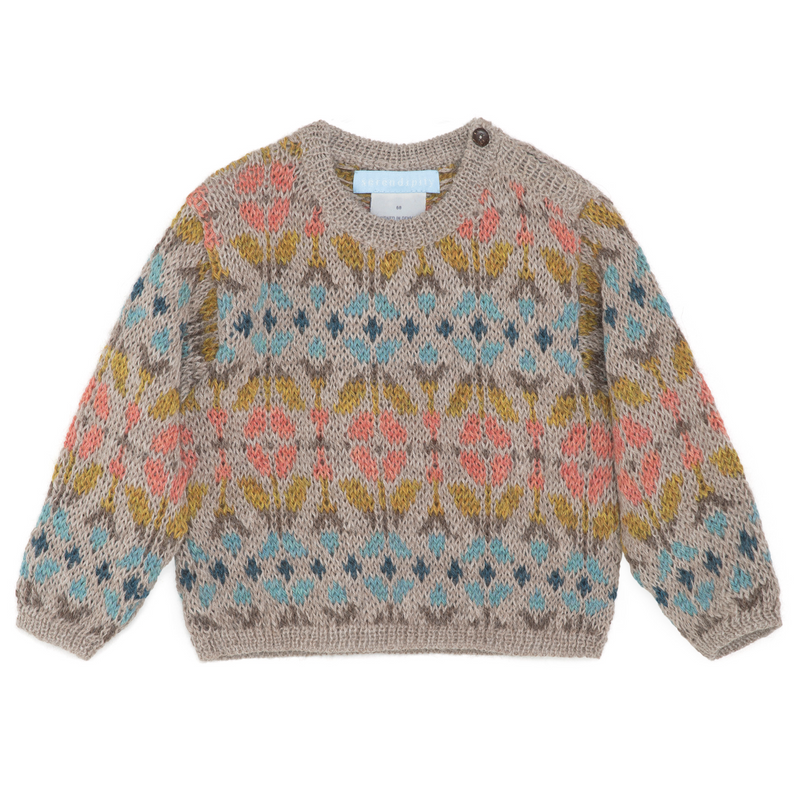 Knitted sweater with a geometric pattern on a white background