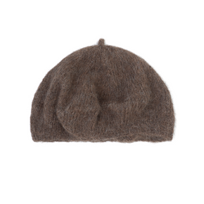 Brown knit beret on a white background