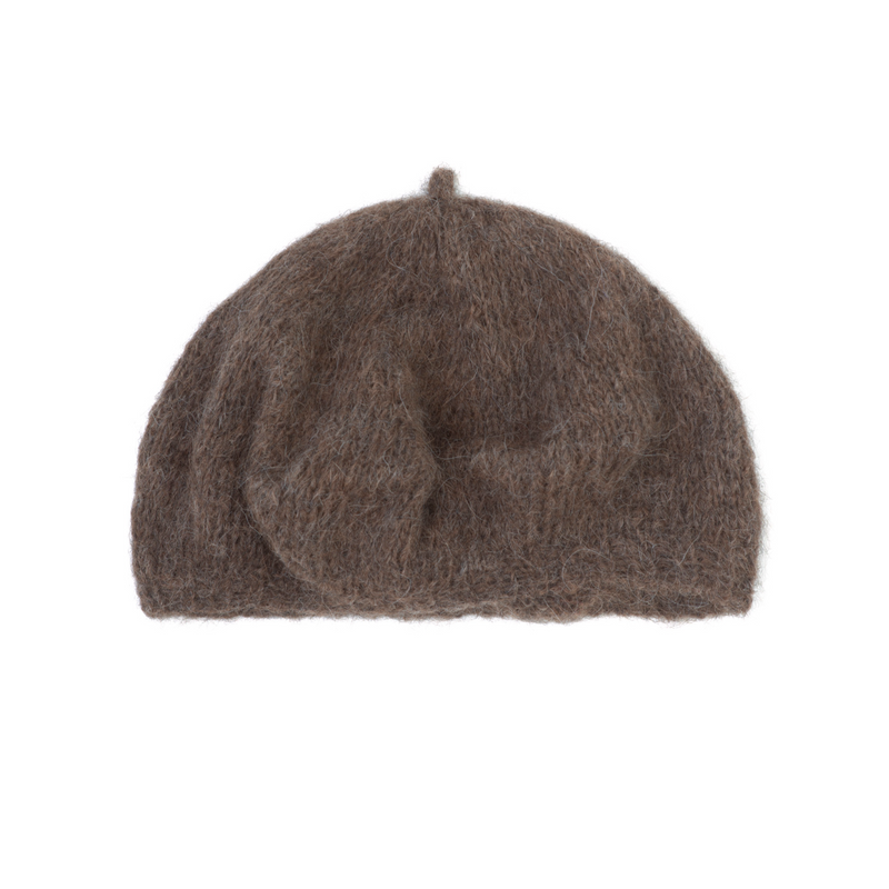 Brown knit beret on a white background