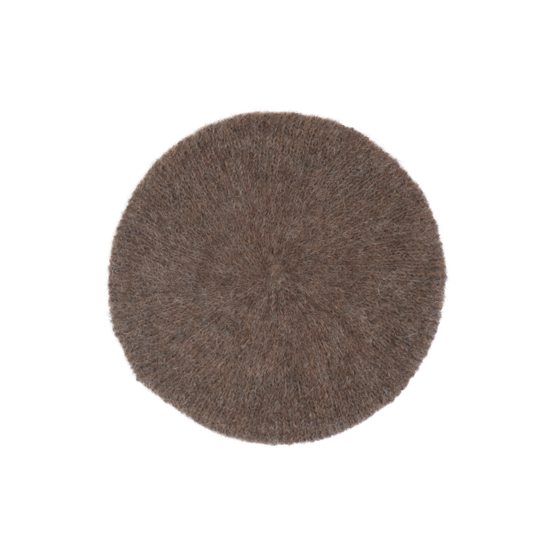 Brown knit beret on a white background