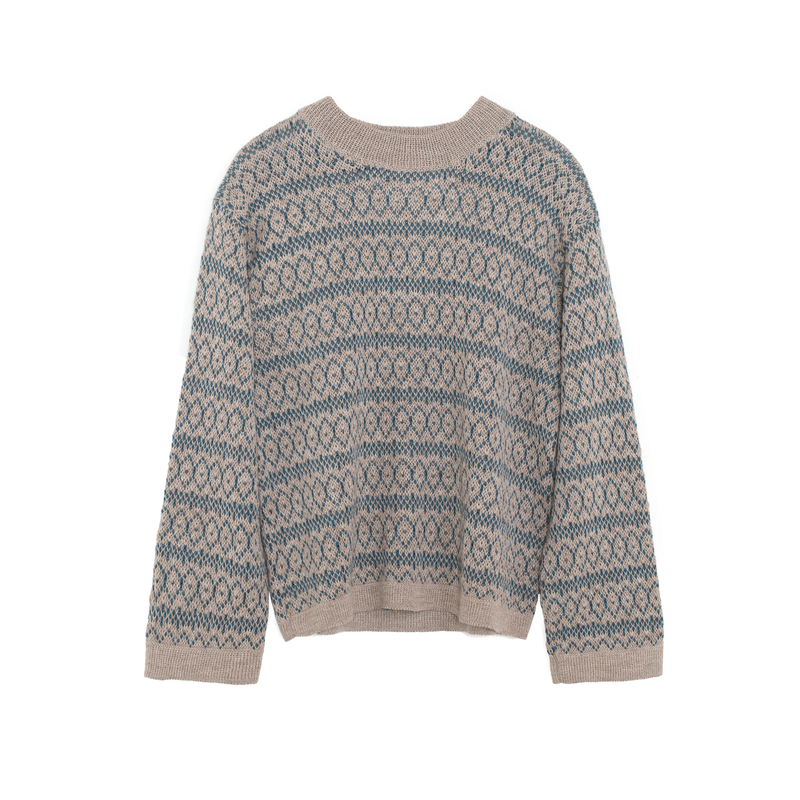 Knitted sweater with a pattern on a white background