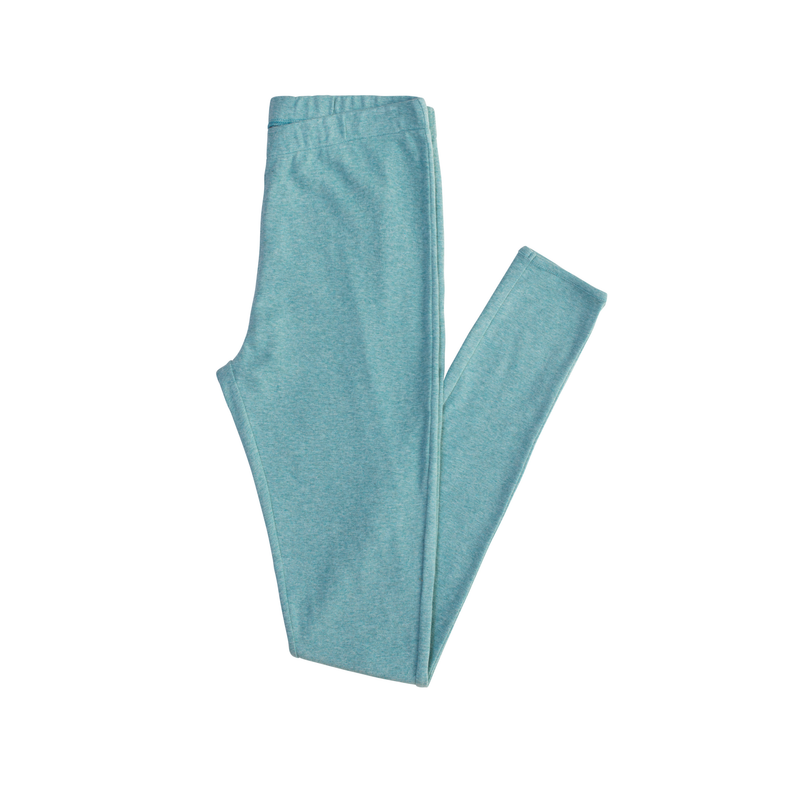 Teal leggings folded on a white background