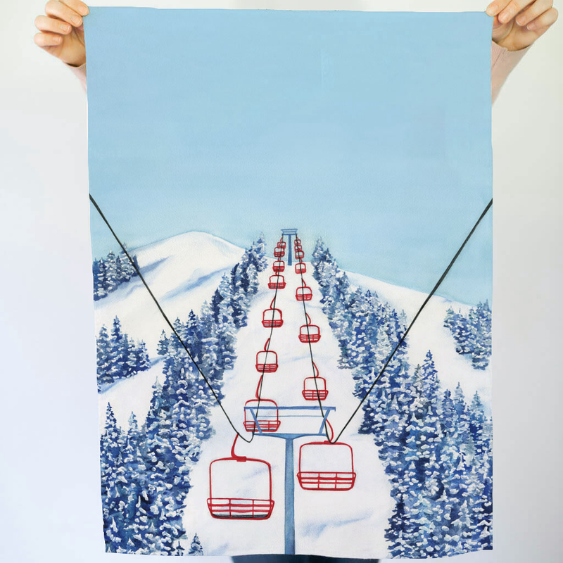 Tea towel with red ski lift design