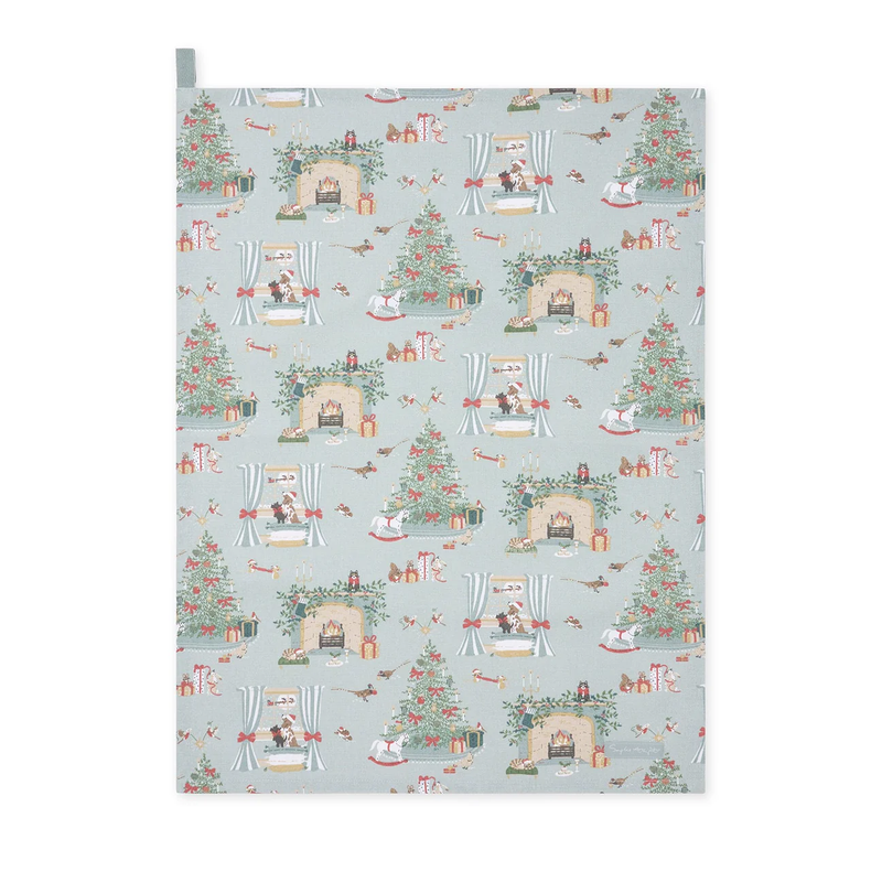 Christmas-themed tea towel with festive scenes on a light blue background