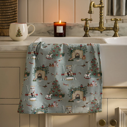 Decorative towel with Christmas pattern on a kitchen sink