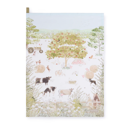 Tea towel with a pastoral scene with animals and nature elements on a white background