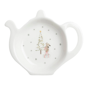 White ceramic tea bag holder with Christmas design on a white background