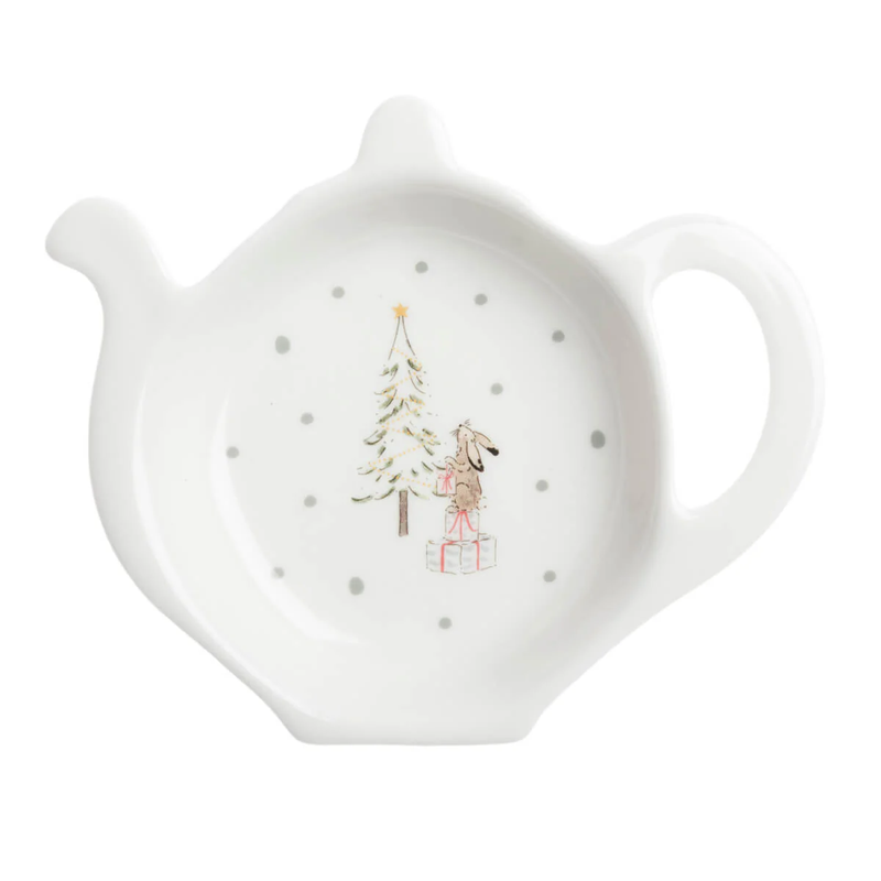 White ceramic tea bag holder with Christmas design on a white background