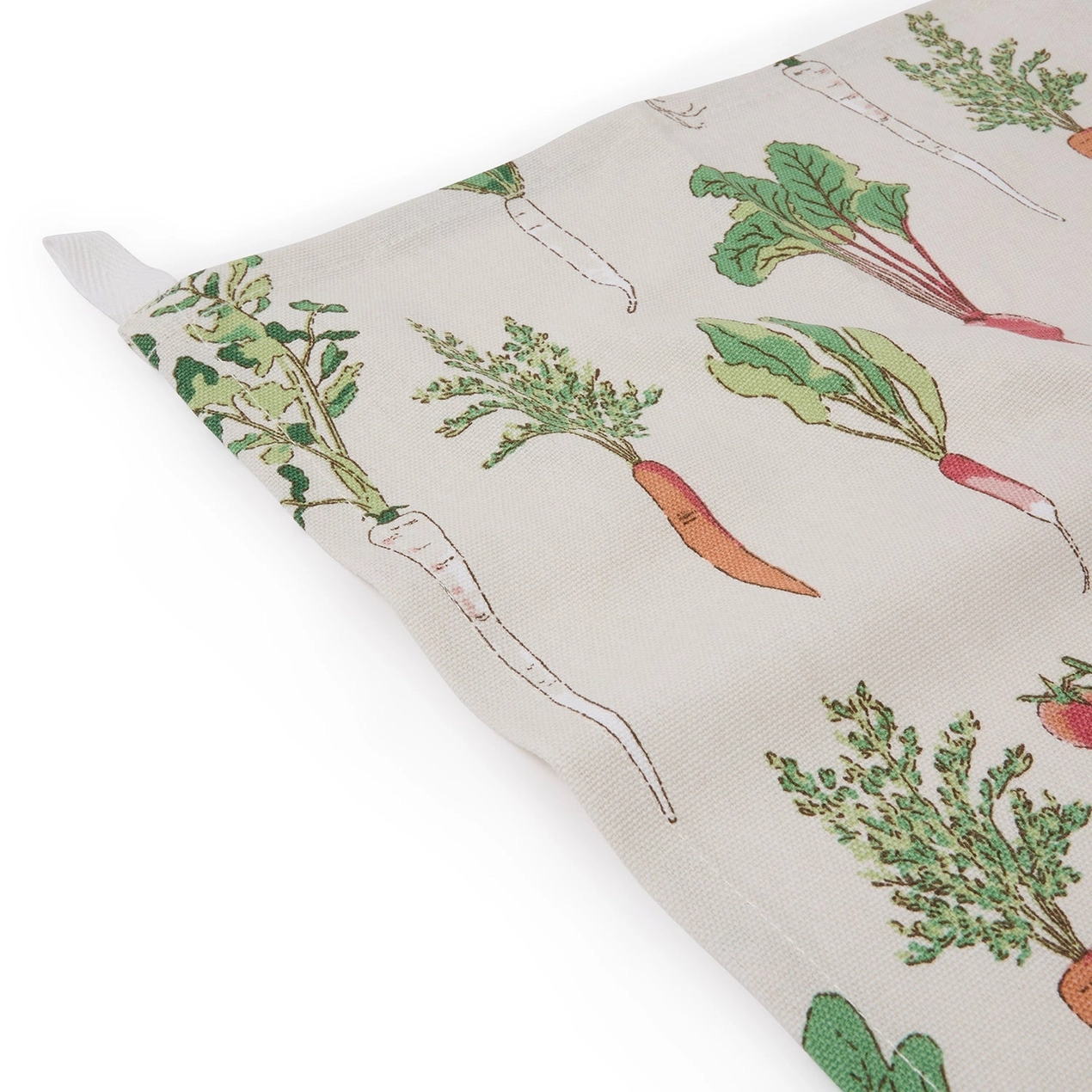 Tea towel with vegetable pattern on a white background