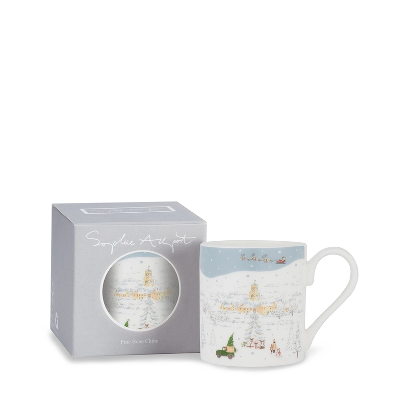 Mug with Christmas design in a branded box on a white background