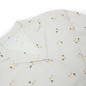 Pajama top with sheep pattern on a light background