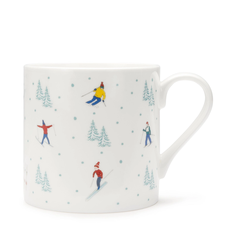 White mug with skiing design on a white background