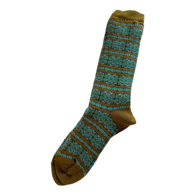 Knitted sock with green and blue pattern on a white background